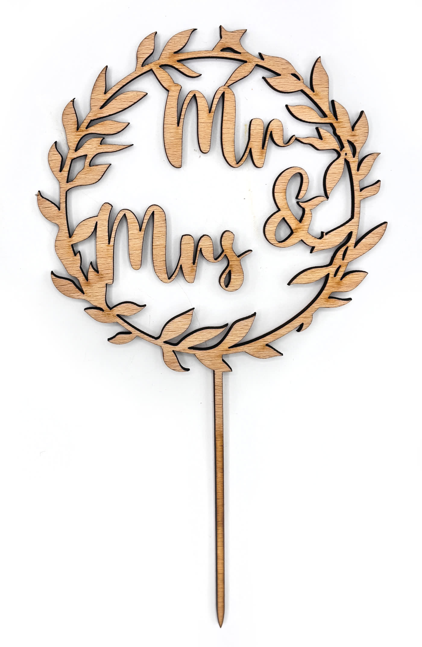 Mr and Mrs cake topper cut as a single connected piece inside a laurel wreath